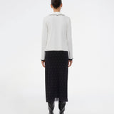 Form-fitting mesh skirt with polka dots and petticoat. Made from 92% recycled polyester, the Samalamd Print Skirt combines stretchability with comfort.
