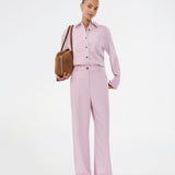 Suit pants in light pink with wide legs. The Sophiemd pants feature a zipper, belt loops, and a relaxed fit – a feminine, modern look that’s perfect with a t-shirt or knit.
