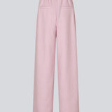 Suit pants in light pink with wide legs. The Sophiemd pants feature a zipper, belt loops, and a relaxed fit – a feminine, modern look that’s perfect with a t-shirt or knit.
