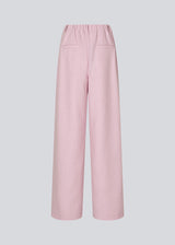 Suit pants in light pink with wide legs. The Sophiemd pants feature a zipper, belt loops, and a relaxed fit – a feminine, modern look that’s perfect with a t-shirt or knit.
