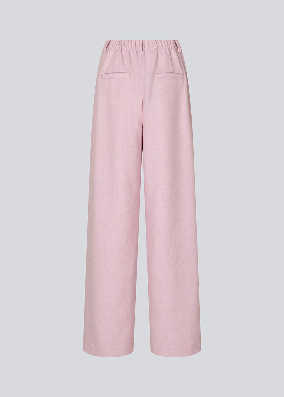 Suit pants in light pink with wide legs. The Sophiemd pants feature a zipper, belt loops, and a relaxed fit – a feminine, modern look that’s perfect with a t-shirt or knit.

