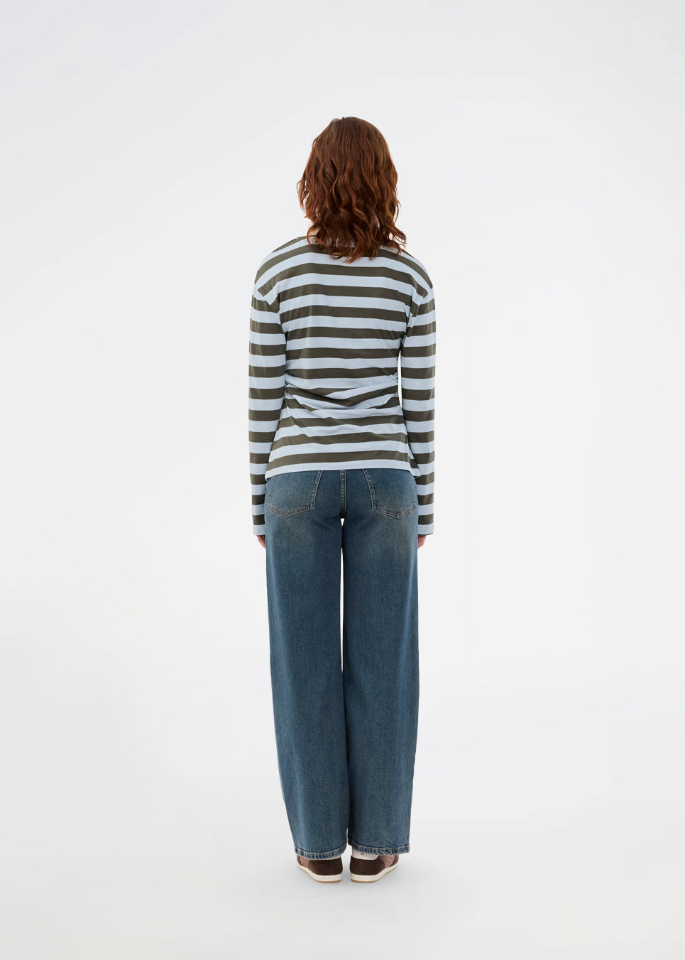 Form-fitting polo with thick blue and green stripes and a chest logo. The Stetsonmd polo has a collar, long sleeves and button closure at the chest. A stylish polo shirt that stands out and lifts both suit trousers and jeans to a sharp look.