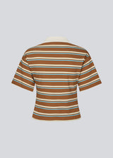 Short-sleeve polo with stripes. The StetsonMD SS Polo is fitted with wide sleeves and features a collar, buttons, and a subtle chest logo. A sporty and modern top that combines classic details with a feminine fit.
 