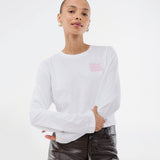 Long-sleeved white T-shirt in 100% organic cotton with "Out of Office" print on the chest. The Sugarmd LS shirt is a casual but cool choice for everyday life with the quote in a fresh pink color.