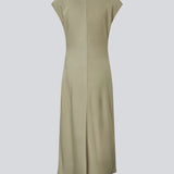 Sleeveless maxi dress light green with pleats on the side. TailorMD dress is made in satin and has a high neck, an invisible zipper in the back, and a slit in the side seam.&nbsp;