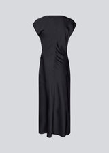 Dark blue Sleeveless maxi dress with pleats in the side. TailorMD dress is made in satin and has a high neck, invisible zipper in the back and a slit in the side seam.