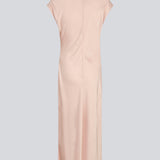 Sleeveless maxi dress in light pink with pleats on the side. TailorMD dress is made in satin and has a high neck, an invisible zipper in the back and a slit in the side seam. The model is 175 cm and wears a size s/36.