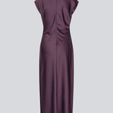 Purple sleeveless maxi dress with pleats in the side. TailorMD dress is made in satin and has a high neck, invisible zipper in the back and a slit in the side seam. The model is 175 cm and wears a size s/36.
