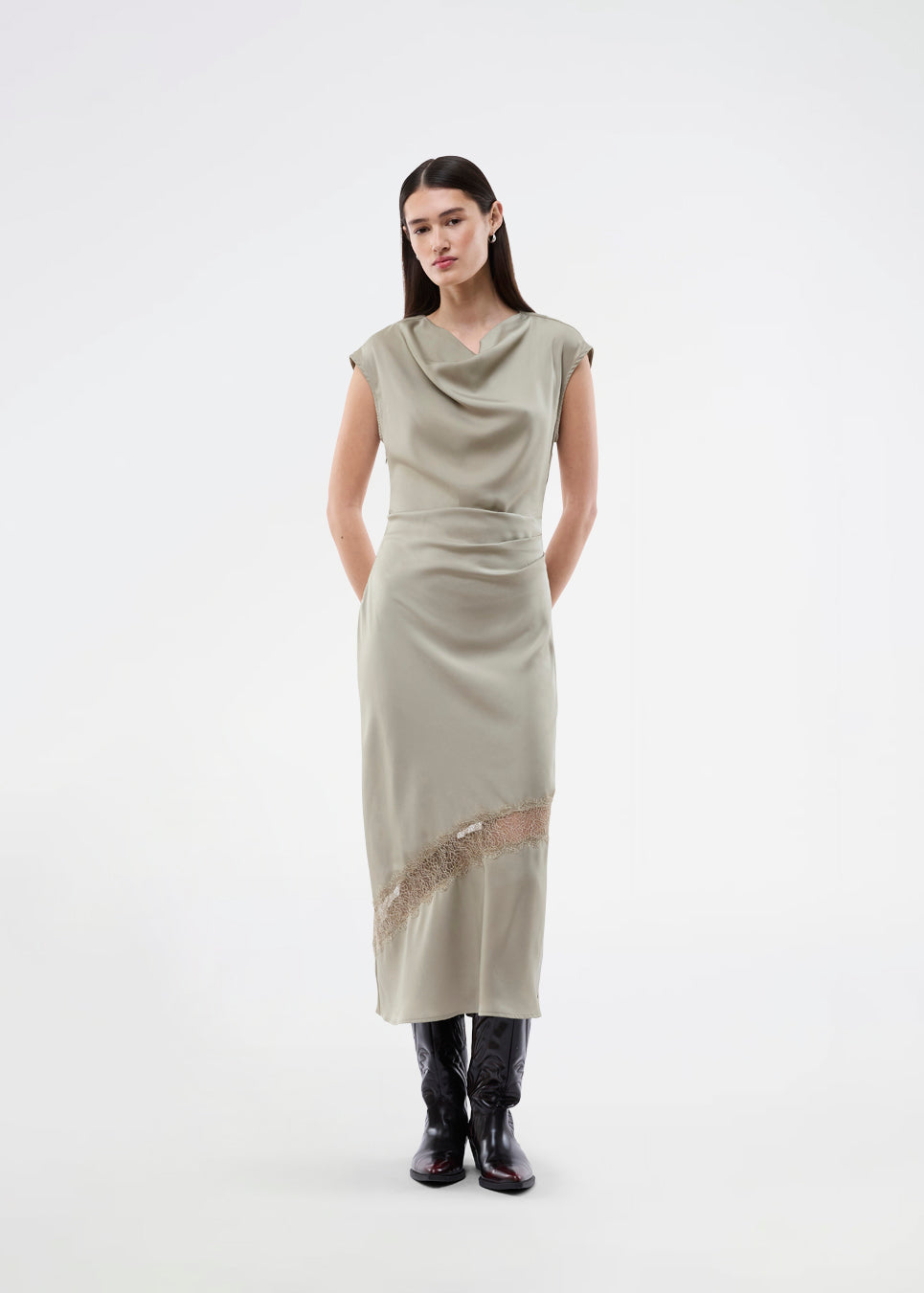 Long sleeveless satin dress with ruched detailing. The TailorMD Lace Dress features lace accents, a high neckline, an invisible back zipper, and a side slit. 