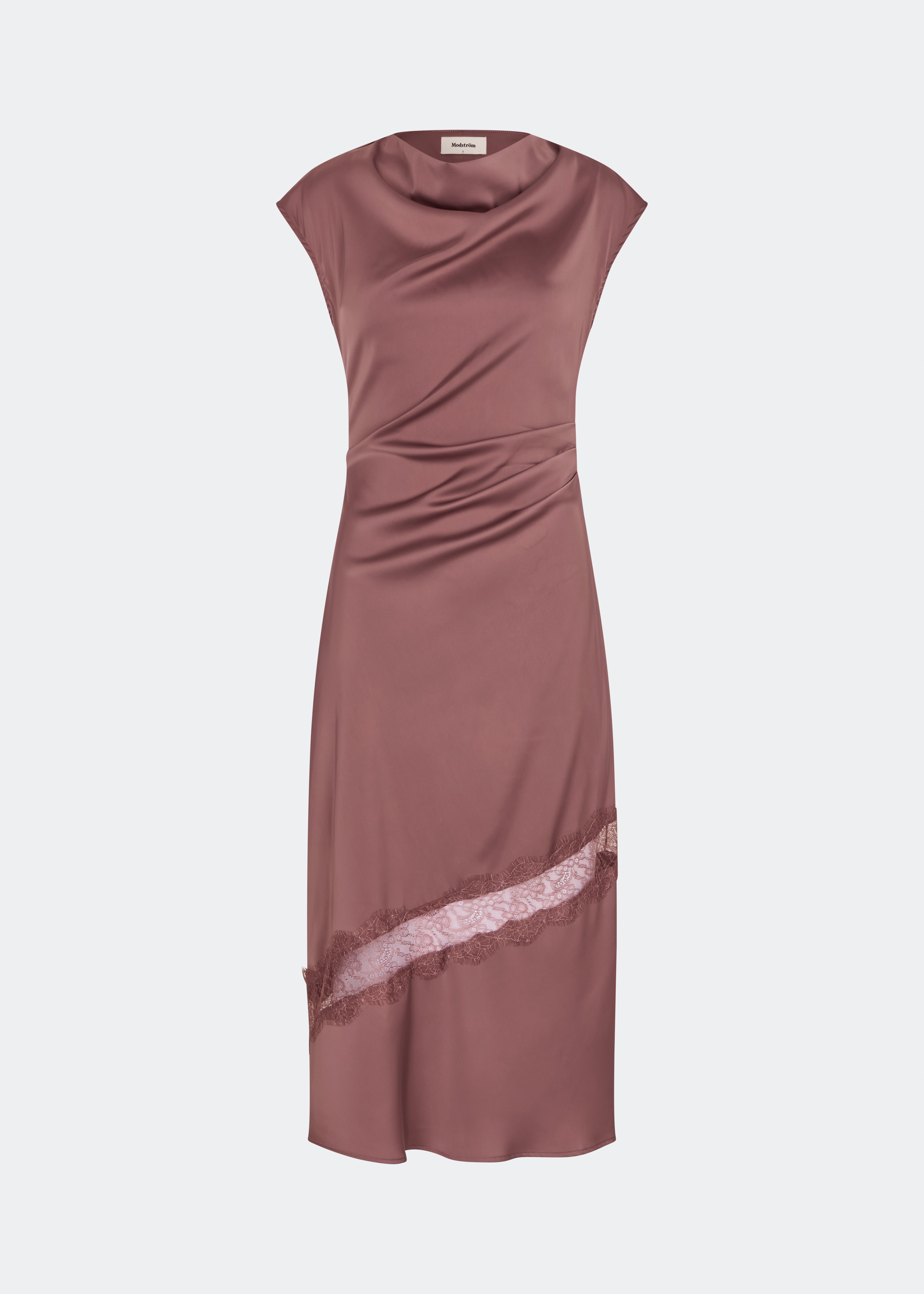 Sleeveless satin maxi dress with a high draped neckline, gathered side detail and diagonal lace panel. Finished with a concealed back zip and side slit. Wear it with slim heels or layer the matching Tailor cape over the shoulders.