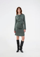 Short dress in green with flattering gathering at the waist and slight waterfall neckline. TailorMD dress is made in a beautiful satin and has long sleeves and an invisible zipper in the back.