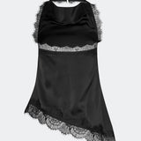Elegant and sophisticated top. TamalMD top is designed with graceful draping and delicate lace details that create a feminine and exclusive look. Perfect for both evening wear and styling with a modern, fashion-forward touch.