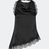 Elegant and sophisticated top. TamalMD top is designed with graceful draping and delicate lace details that create a feminine and exclusive look. Perfect for both evening wear and styling with a modern, fashion-forward touch.