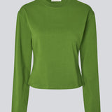 Light cropped T-shirt in soft 100% organic cotton. The TampaMD T-Shirt features a round neckline, long sleeves, and a fitted silhouette - a sleek and trendy wardrobe essential, perfect for layering or casual looks.