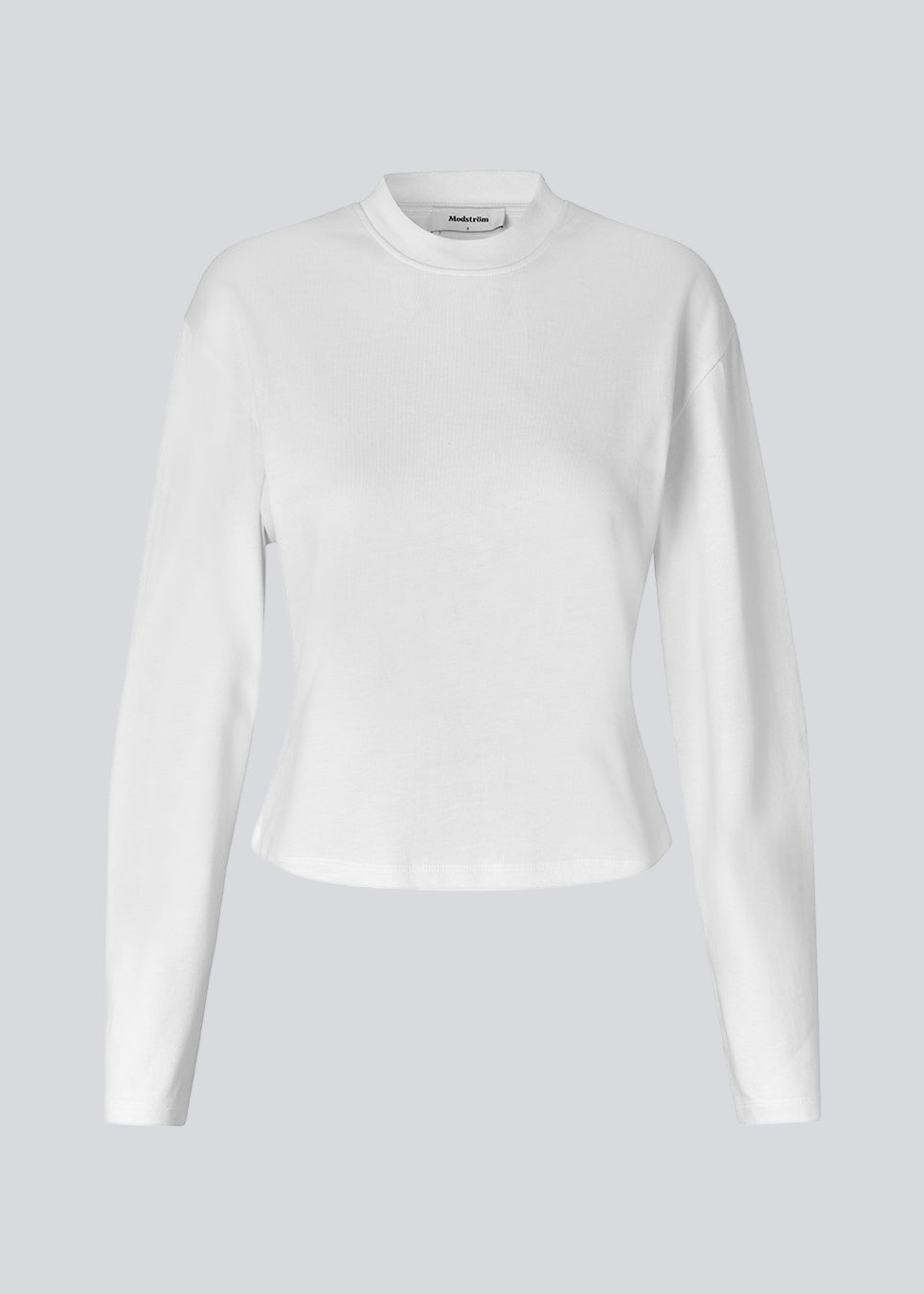 Slightly cropped long-sleeved t-shirt in white in 100% organic cotton. Tampamd LS t-shirt has a round neck and a fitted look.