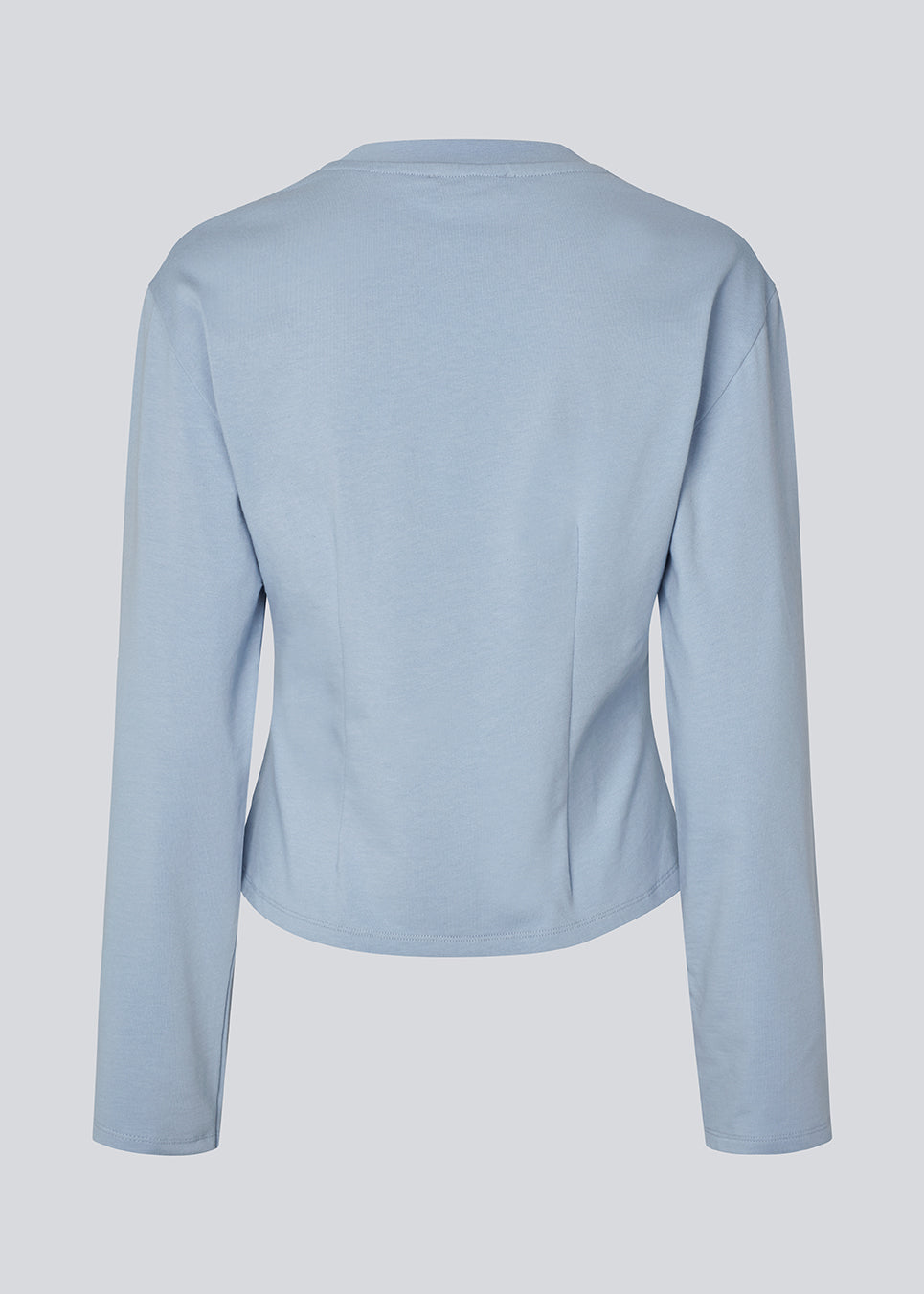 Light cropped T-shirt in soft 100% organic cotton. The TampaMD T-Shirt features a round neckline, long sleeves, and a fitted silhouette - a sleek and trendy wardrobe essential, perfect for layering or casual looks.