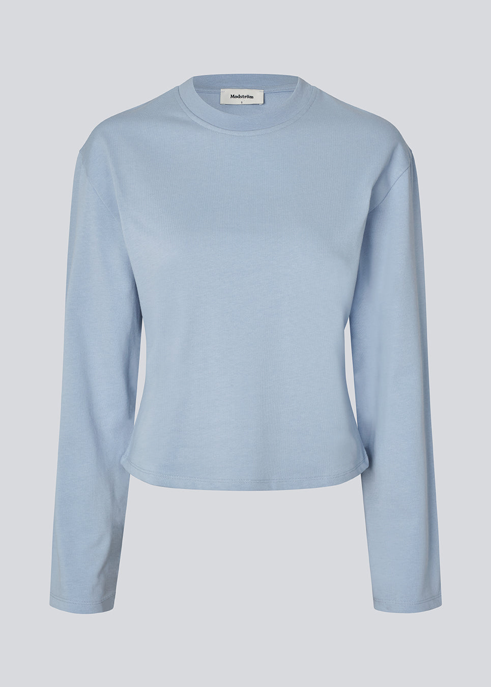 Light cropped T-shirt in soft 100% organic cotton. The TampaMD T-Shirt features a round neckline, long sleeves, and a fitted silhouette - a sleek and trendy wardrobe essential, perfect for layering or casual looks.