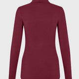 Roll-neck top in soft jersey with stretch and long sleeves. TannerMD top follows the body for a close fit. Wear it beneath an open shirt or with wide-leg pants to balance the silhouette.&nbsp;