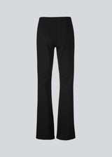 Nice pants with flared legs and front pockets. The stretchy material and elastic waist create the perfect fit. Tanny Flare pants in Black are a must-have basic style in your wardrobe. The model is 174 cm and wears a size S/36