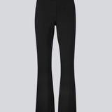 Nice pants with flared legs and front pockets. The stretchy material and elastic waist create the perfect fit. Tanny Flare pants in Black are a must-have basic style in your wardrobe. The model is 174 cm and wears a size S/36