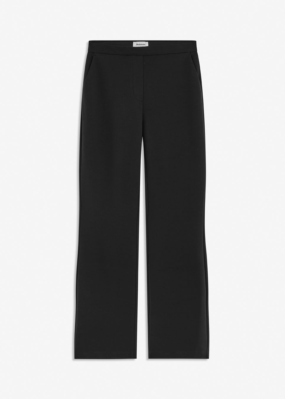 Nice pants with flared legs and front pockets. The stretchy material and elastic waist create the perfect fit. Tanny Flare pants in Black are a must-have basic style in your wardrobe. The model is 174 cm and wears a size S/36
