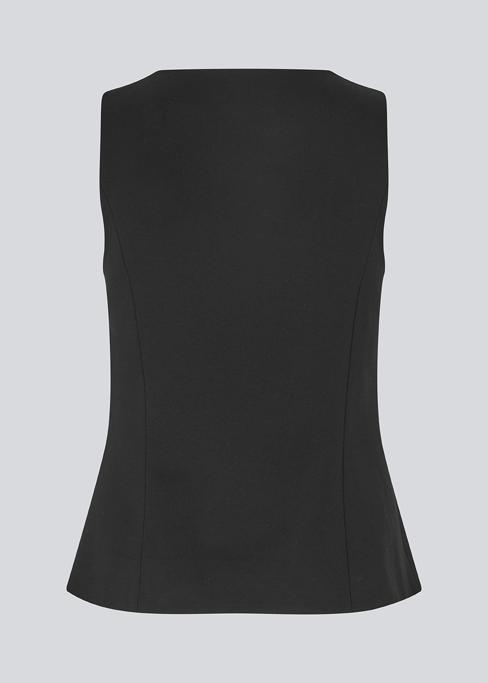 Sleeveless top with button closure in jersey. Tannymd top has is fitted and has a round neckline. The model is 175 cm and wears a size S/36