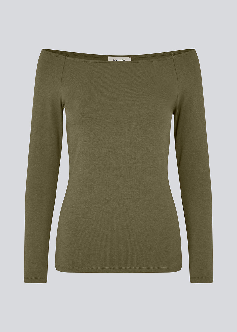 Tansy LS top is in a green color and has a simple expression with a wide neckline and long, slim sleeves. The top has a tight-fitted silhouette. The model is 173 cm and wears a size S/36.