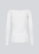 Tansy LS top in White has a simple expression with a wide neckline and long, slim sleeves. The top has a tight-fitted silhouette.