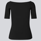 Tansy top in black has a simple look with a wide neckline at front and back and narrow sleeves. The top is slim fit without being tight. A basic must-have style in your waredrobe.