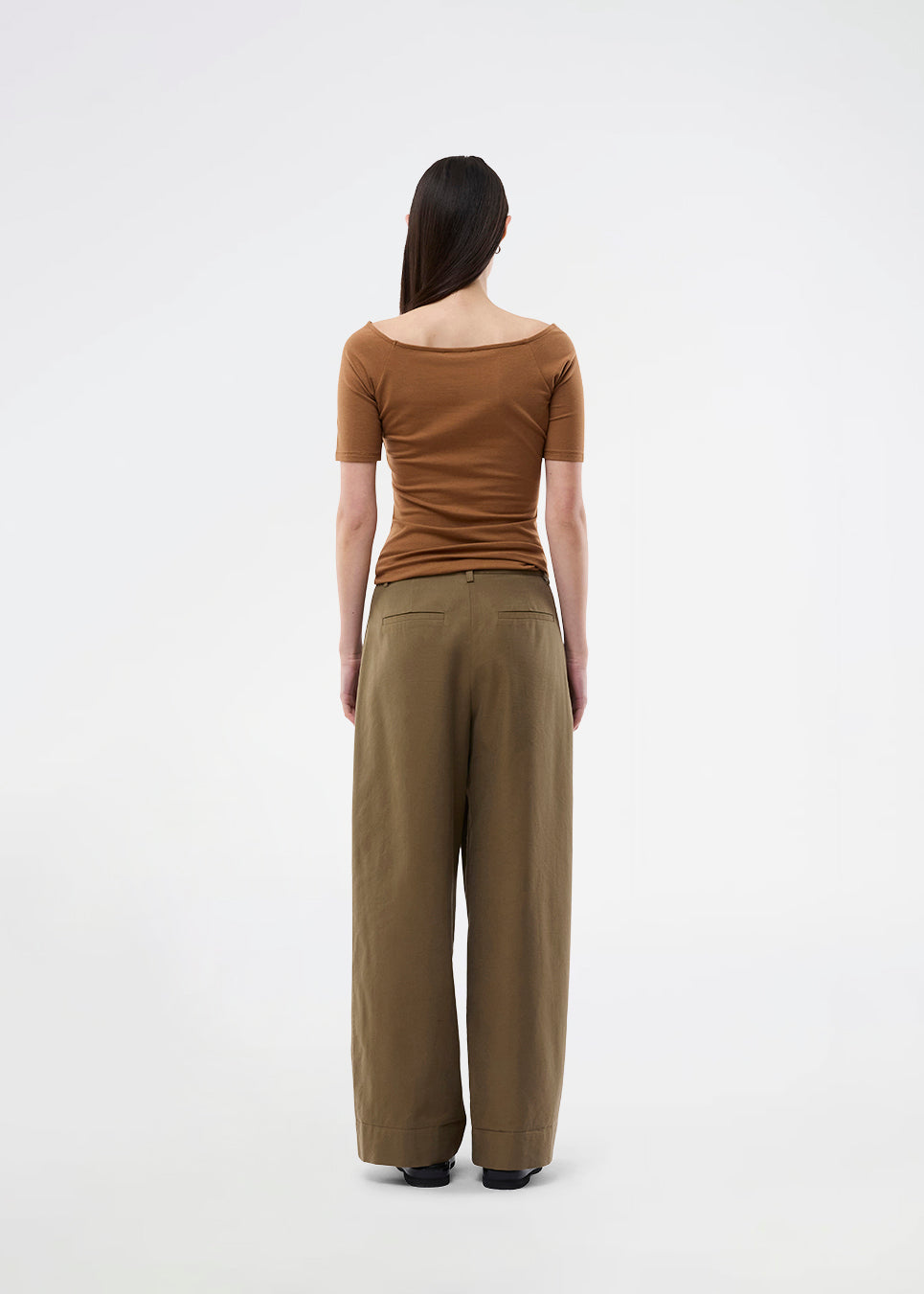 Tansy top has a simple look with a wide neckline at front and back and narrow sleeves. The top is slim fit without being tight.