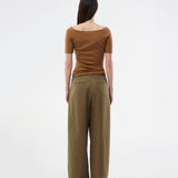 Tansy top has a simple look with a wide neckline at front and back and narrow sleeves. The top is slim fit without being tight.