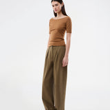Tansy top has a simple look with a wide neckline at front and back and narrow sleeves. The top is slim fit without being tight.
