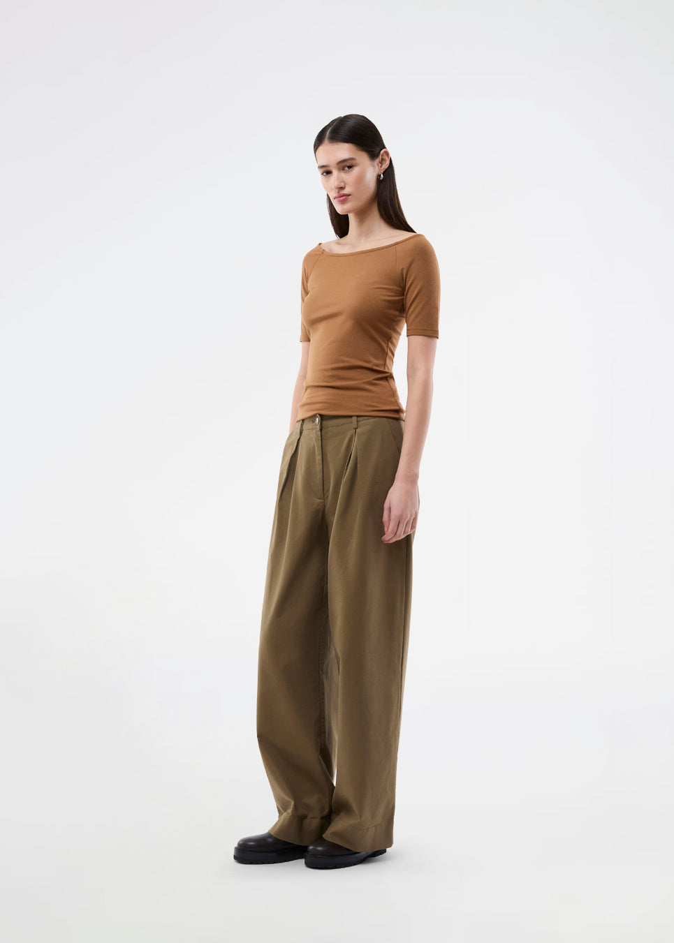 Tansy top has a simple look with a wide neckline at front and back and narrow sleeves. The top is slim fit without being tight.