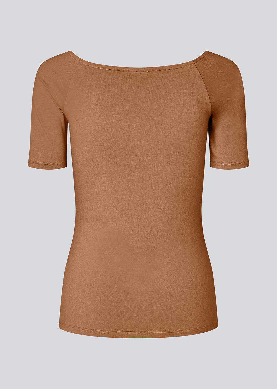 Tansy top has a simple look with a wide neckline at front and back and narrow sleeves. The top is slim fit without being tight.