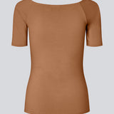 Tansy top has a simple look with a wide neckline at front and back and narrow sleeves. The top is slim fit without being tight.