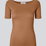 Tansy top has a simple look with a wide neckline at front and back and narrow sleeves. The top is slim fit without being tight.