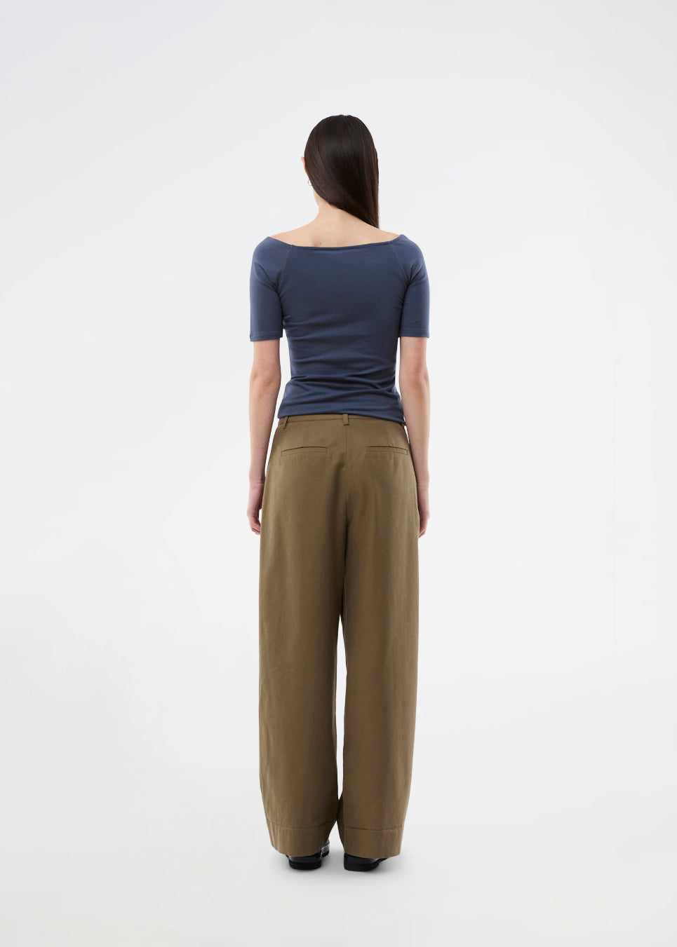 Tansy top has a simple look with a wide neckline at front and back and narrow sleeves. The top is slim fit without being tight.