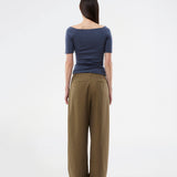 Tansy top has a simple look with a wide neckline at front and back and narrow sleeves. The top is slim fit without being tight.