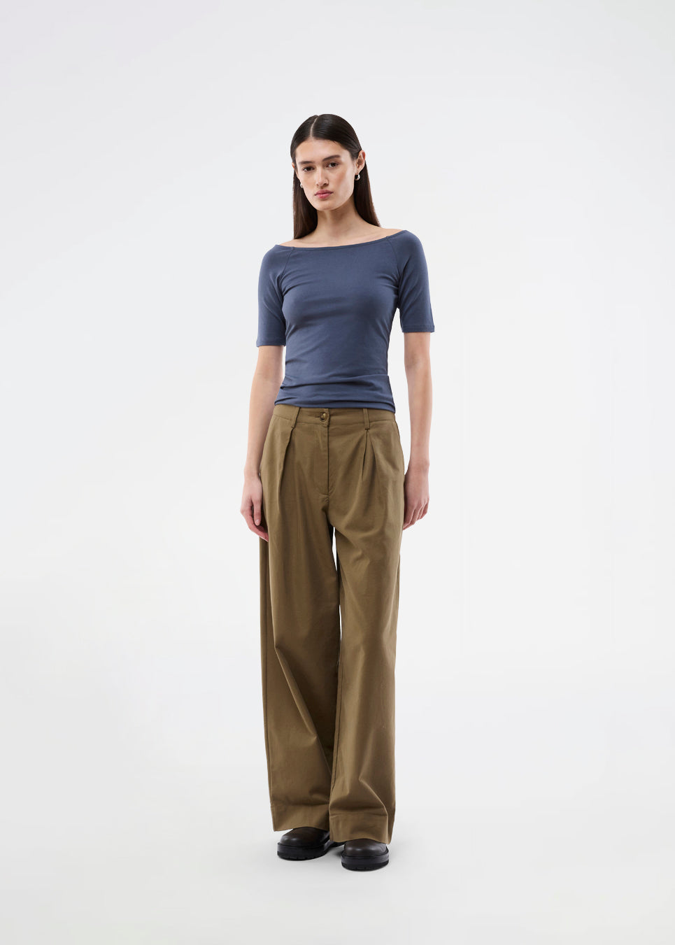Tansy top has a simple look with a wide neckline at front and back and narrow sleeves. The top is slim fit without being tight.