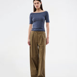 Tansy top has a simple look with a wide neckline at front and back and narrow sleeves. The top is slim fit without being tight.