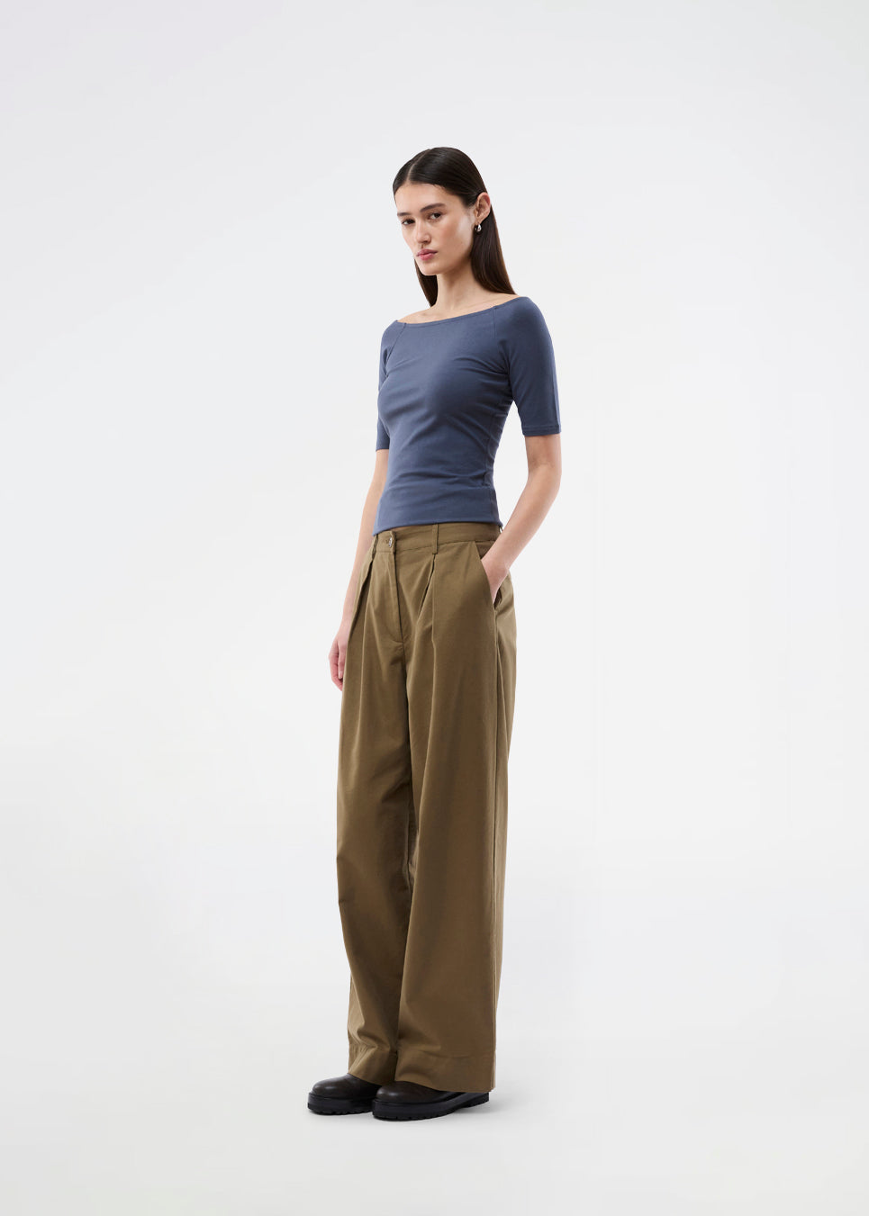 Tansy top has a simple look with a wide neckline at front and back and narrow sleeves. The top is slim fit without being tight.