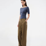 Tansy top has a simple look with a wide neckline at front and back and narrow sleeves. The top is slim fit without being tight.