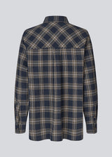 Classic oversize shirt in flannel in navy sky. TappoMD shirt has a chest pocket, button closure in front and a manchet with button closure.&nbsp;