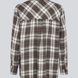 Classic oversize shirt in flannel in brown. TappoMD shirt has a chest pocket, button closure in front and a manchet with button closure.&nbsp;