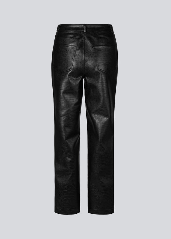 Black pants in a soft black faux leather material with a croc-style effect. TerriMD pants have straight wide legs with a medium-high waist in a classic five-pocket design.