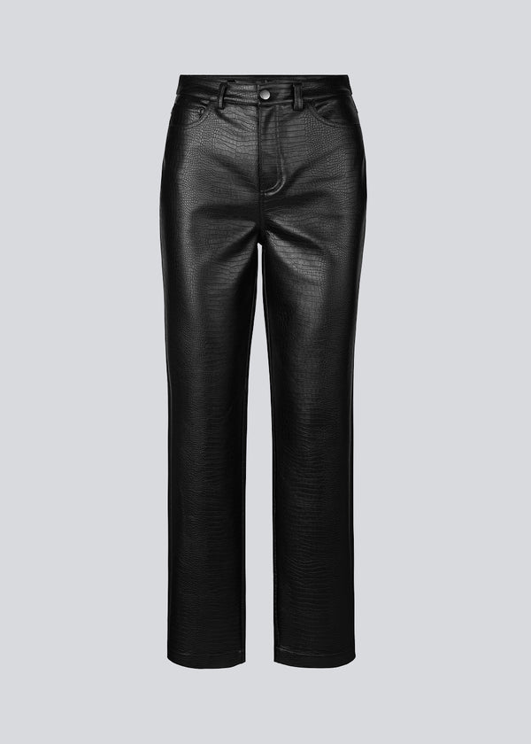 Black pants in a soft black faux leather material with a croc-style effect. TerriMD pants have straight wide legs with a medium-high waist in a classic five-pocket design.