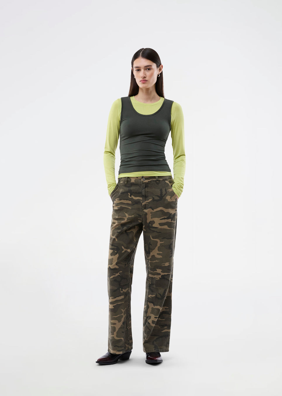 Modern layering long-sleeved blouse/top. ThaliaMD LS T-shirt is designed with a refined double-layer look that adds depth and a modern expression. The soft, stretchy fabric and fitted silhouette make it ideal both on its own and as a stylish layering piece in a fashion-conscious wardrobe. Colors are lime green and army green.
