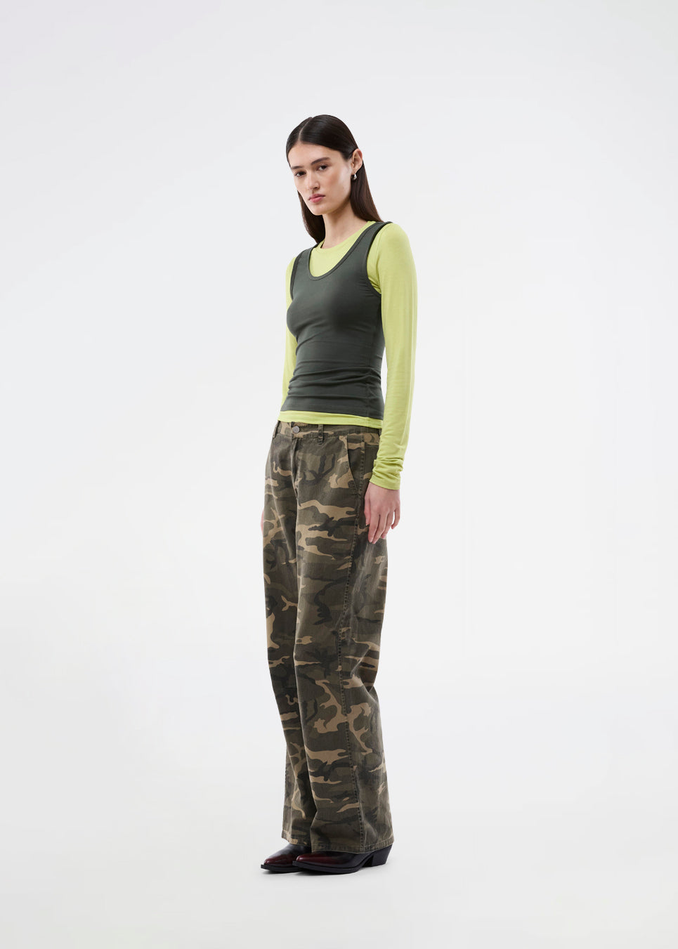 Modern layering long-sleeved blouse/top. ThaliaMD LS T-shirt is designed with a refined double-layer look that adds depth and a modern expression. The soft, stretchy fabric and fitted silhouette make it ideal both on its own and as a stylish layering piece in a fashion-conscious wardrobe. Colors are lime green and army green.
