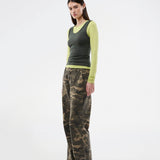Modern layering long-sleeved blouse/top. ThaliaMD LS T-shirt is designed with a refined double-layer look that adds depth and a modern expression. The soft, stretchy fabric and fitted silhouette make it ideal both on its own and as a stylish layering piece in a fashion-conscious wardrobe. Colors are lime green and army green.
