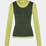 Modern layering long-sleeved blouse/top. ThaliaMD LS T-shirt is designed with a refined double-layer look that adds depth and a modern expression. The soft, stretchy fabric and fitted silhouette make it ideal both on its own and as a stylish layering piece in a fashion-conscious wardrobe. Colors are lime green and army green.
